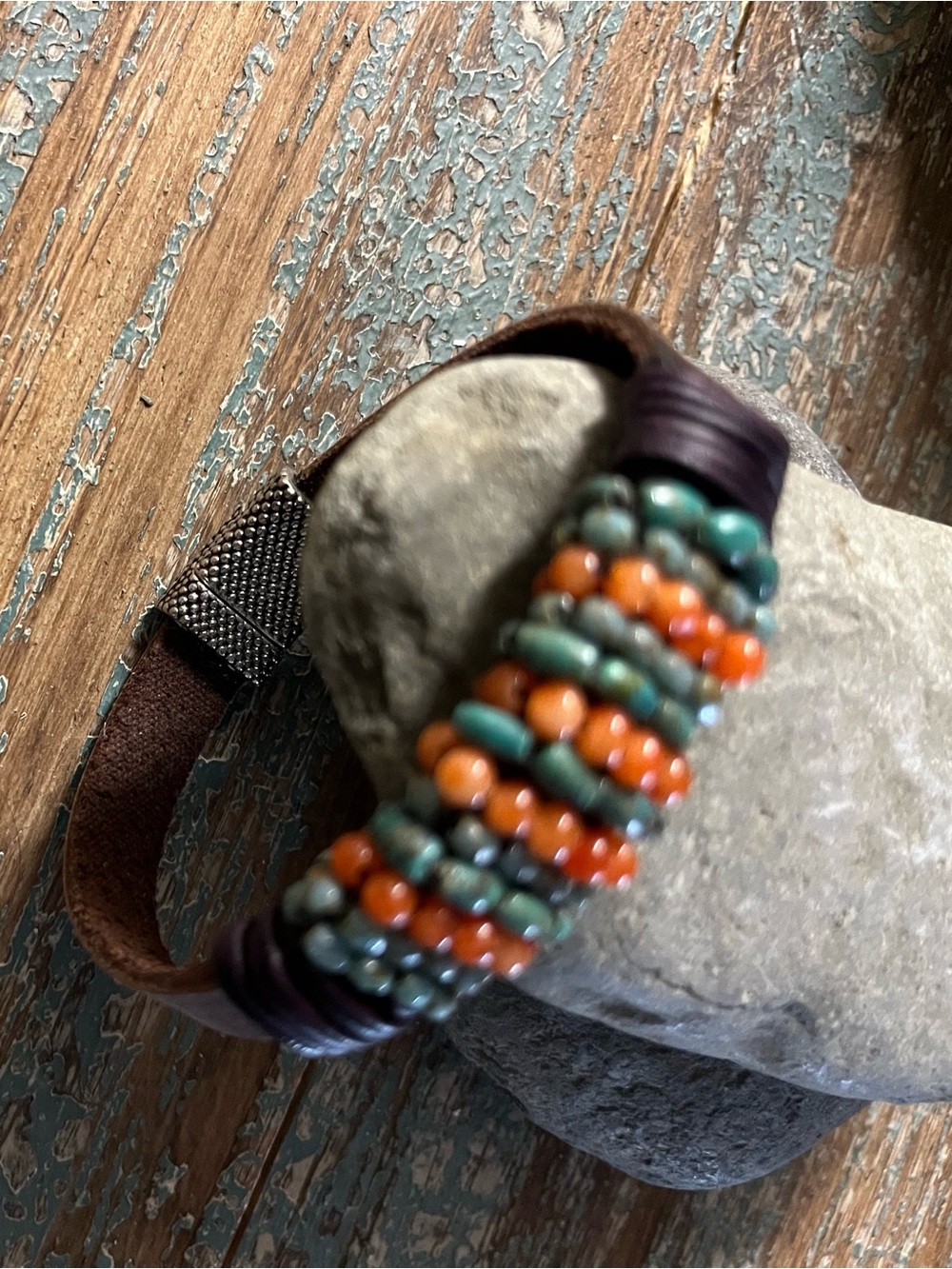 Handmade cuff bracelet of gemstones on leather strap with magnetic box closure